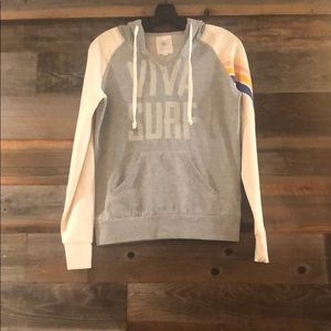 Grey Ripcurl hoodie with pale pink sleeves